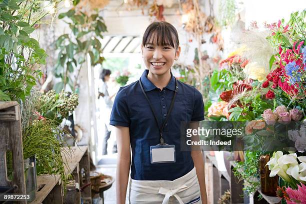 florist in flower shop, portrait - japan 12 years girl stock pictures, royalty-free photos & images
