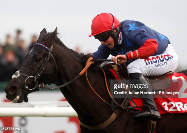 Black Corton ridden by Bryony Frost clear the last fence before going on to win The 32Red Kauto Star Novices' Steeple Chase Race run during the 32Red...