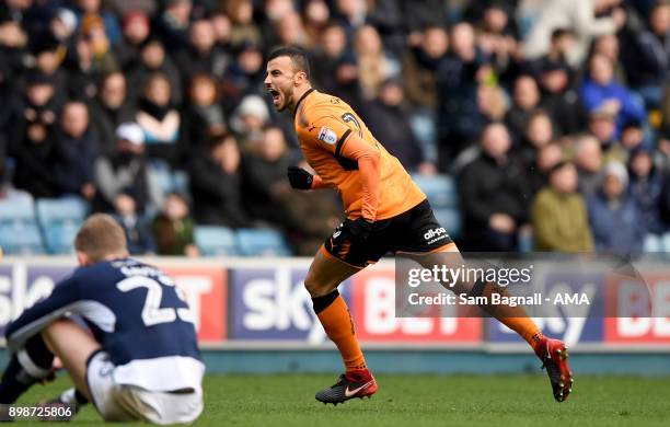 Romain Saiss of Wolverhampton Wanderers celebrates after scoring a goal to make it 1-2 during the Sky Bet Championship match between Millwall and...