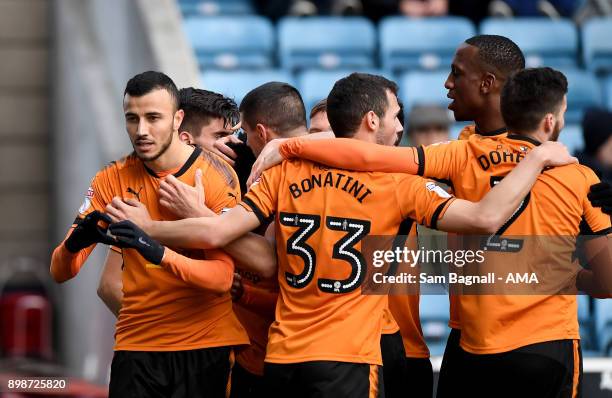 Romain Saiss of Wolverhampton Wanderers celebrates after scoring a goal to make it 1-2 during the Sky Bet Championship match between Millwall and...