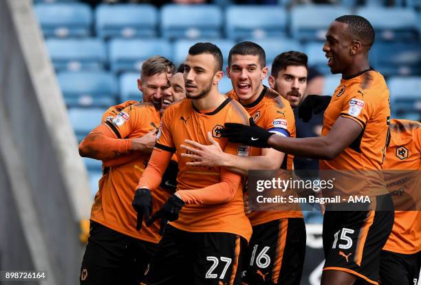 Romain Saiss of Wolverhampton Wanderers celebrates after scoring a goal to make it 1-2 during the Sky Bet Championship match between Millwall and...