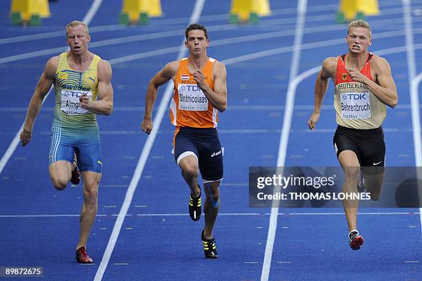 Sweden's Daniel Almgren, Netherland's Eelco Sintnicolaas and Germany's Pascal Behrenbruch compete in the 100m race of the men's decathlon during the...