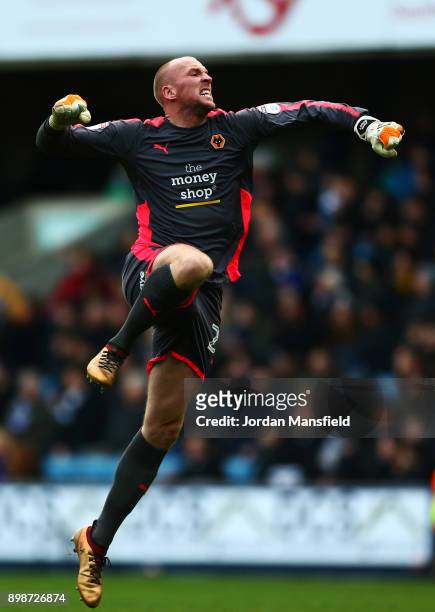 John Ruddy of Wolves celebrates his sides first goal during the Sky Bet Championship match between Millwall and Wolverhampton at The Den on December...