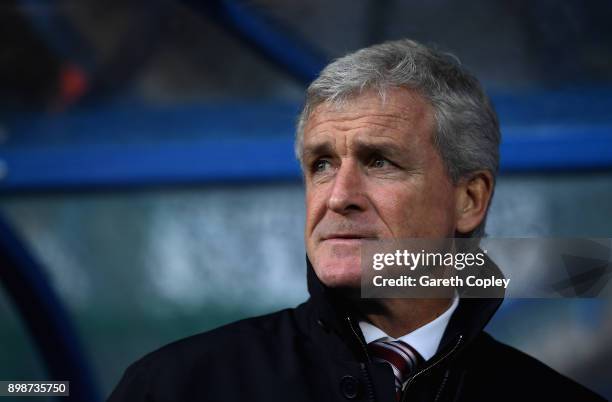 Mark Hughes, Manager of Stoke City looks on prior to the Premier League match between Huddersfield Town and Stoke City at John Smith's Stadium on...