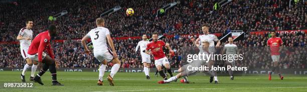 Juan Mata of Manchester United in action with Ben Mee of Burnley during the Premier League match between Manchester United and Burnley at Old...