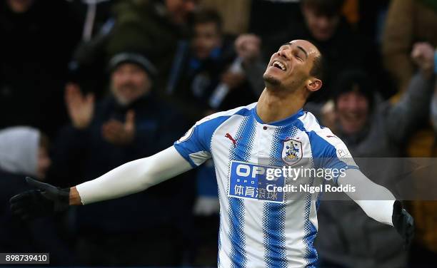 Tom Ince of Huddersfield Town celebrates after scoring his sides first goal during the Premier League match between Huddersfield Town and Stoke City...