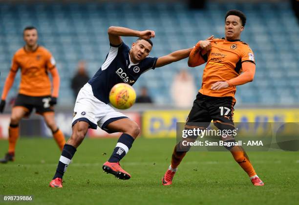 James Meredith of Millwall and Helder Costa of Wolverhampton Wanderers during the Sky Bet Championship match between Millwall and Wolverhampton at...