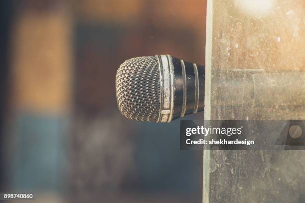 vintage microphone on window - condenser microphone stock pictures, royalty-free photos & images