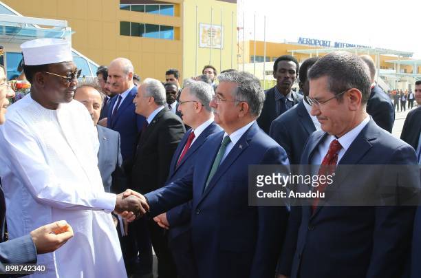 President of Chad Idriss Deby shakes hands with Turkish Minister of Food, Agriculture and Livestock Ahmet Esref Fakibaba , Turkish Finance Minister...
