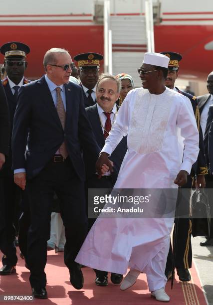 Turkish President Recep Tayyip Erdogan and his wife Emine Erdogan are welcomed by President of Chad Idriss Deby and his wife Hinda Deby upon their...