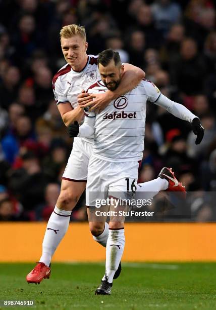 Steven Defour of Burnley celebrates scoring the 2nd Burnley goal with Ben Mee during the Premier League match between Manchester United and Burnley...