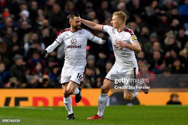 Steven Defour of Burnley celebrates scoring the 2nd Burnley goal with Ben Mee during the Premier League match between Manchester United and Burnley...