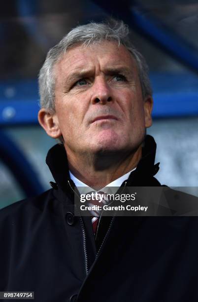 Mark Hughes, Manager of Stoke City looks on prior to the Premier League match between Huddersfield Town and Stoke City at John Smith's Stadium on...