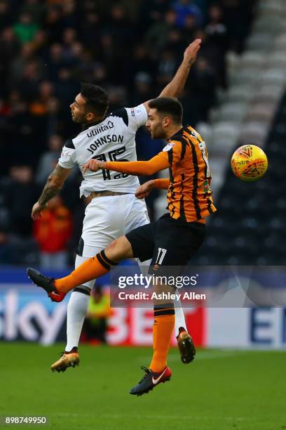 Bradley Johnson of Derby County is challenged by Jon Toral of Hull City during the Sky Bet Championship match between Hull City and Derby County at...