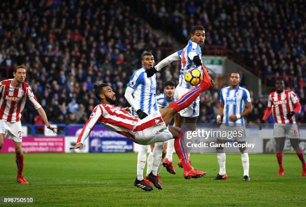 Maxim Choupo-Moting of Stoke City over head kicks during the Premier League match between Huddersfield Town and Stoke City at John Smith's Stadium on...