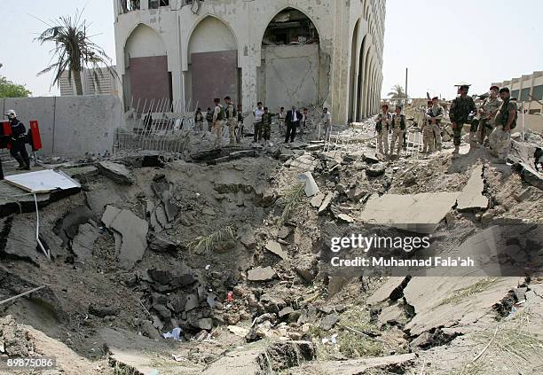 Crater made by a massive explosion is seen in front of the Iraqi Foreign Ministry next to the Green Zone on August 19, 2009 in Baghdad, Iraq. A...