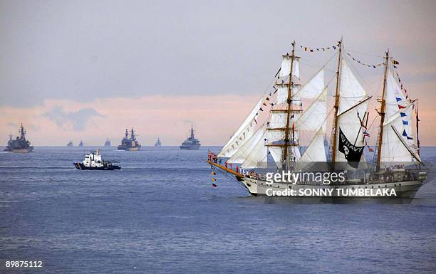 An Indonesian tallship participates in the international fleet review in the waters of Manado in North Sulawesi on August 19, 2009. The naval parade...