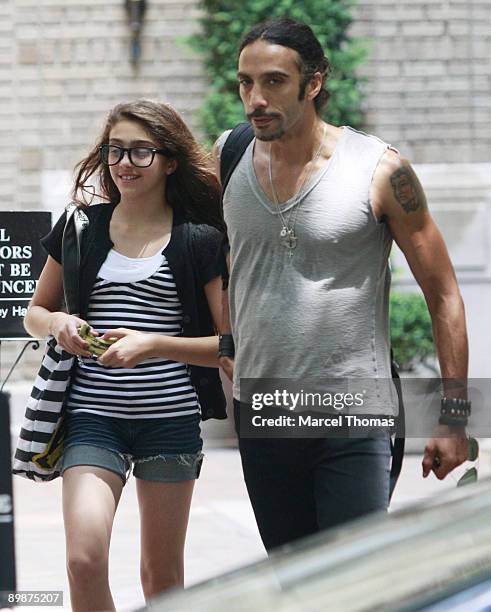 Madonna's daughter Lourdes Leon walks with her father Carlos Leon on the upper west-side of Manhattan on June 30, 2008 in New York City.