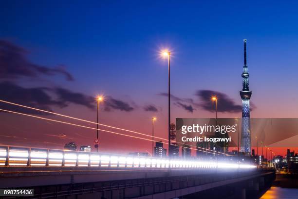 a road to tokyo skytree at twilight - isogawyi stock pictures, royalty-free photos & images