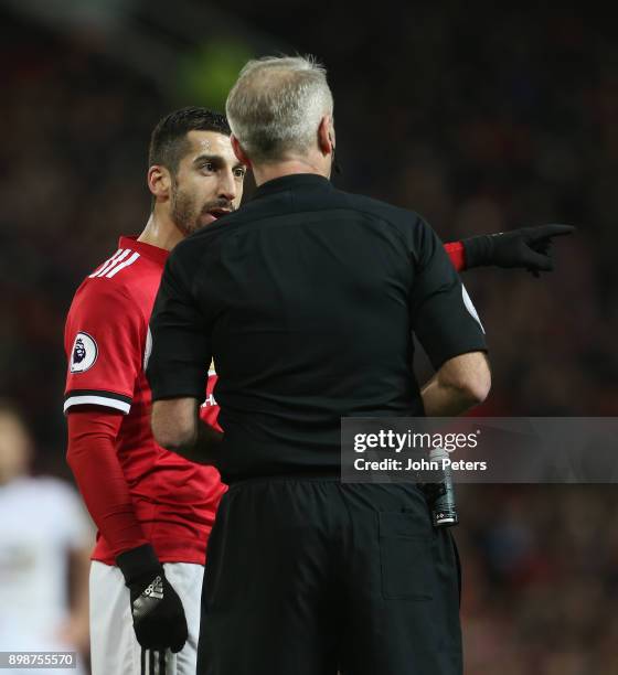 Henrikh Mkhitaryan of Manchester United complains to Referee Martin Atkinson during the Premier League match between Manchester United and Burnley at...