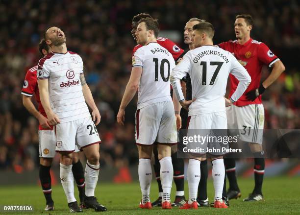 Phil Bardsley of Burnley reacts to a decision by Referee Martin Atkinson during the Premier League match between Manchester United and Burnley at Old...