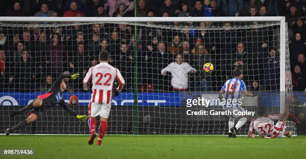 Ramadan Sobhi of Stoke City scores his sides first goal during the Premier League match between Huddersfield Town and Stoke City at John Smith's...