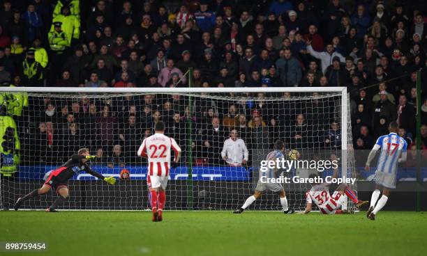 Ramadan Sobhi of Stoke City scores his sides first goal during the Premier League match between Huddersfield Town and Stoke City at John Smith's...