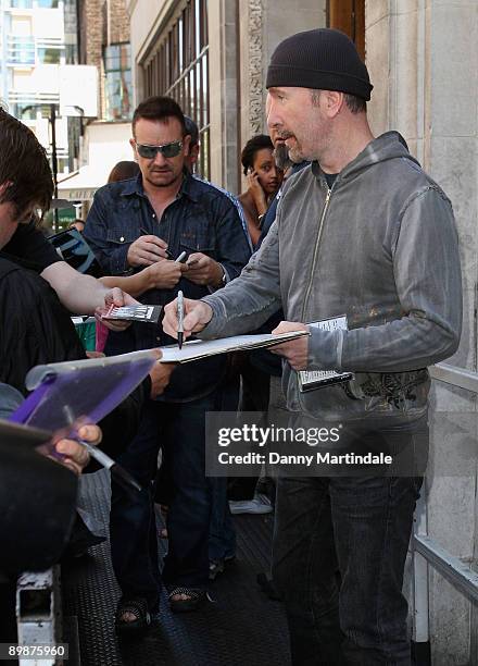 Bono and Edge from U2 leaves the BBC Radio one Studio on August 19, 2009 in London, England.