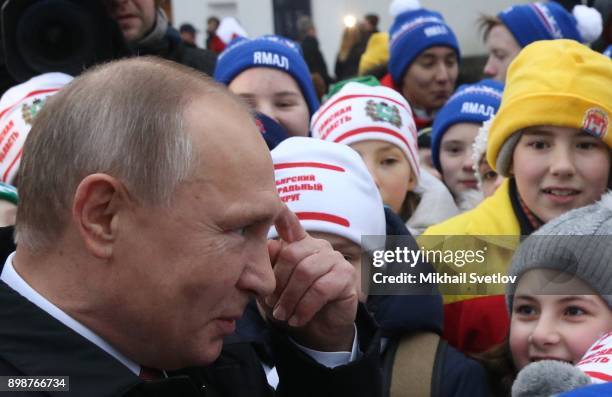 Russian President Vladimir Putin pose for a photo with kids at the Cathedral Square of Moscow's Kremlin, Russia, December 2017. Vladimir Putin met...