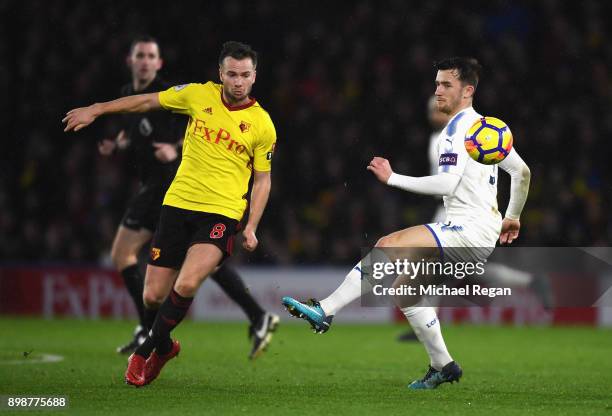 Tom Cleverley of Watford is challenged by Ben Chilwell of Leicester City during the Premier League match between Watford and Leicester City at...