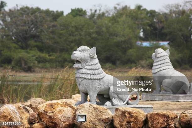 Lion statues at the Victory Monument in Puthukkudiyiruppu, Northern Province, Sri Lanka. This monument depicts a Sri Lankan Army solider waving a...