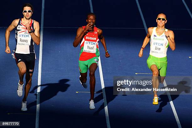 Martyn Rooney of Great Britain & Northern Ireland, Rabah Yousif of Sudan and Sean Wroe of Australia compete in the men's 400 Metres Semi-Final during...