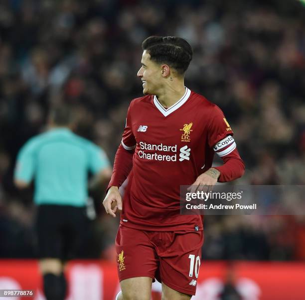 Philippe Coutinho of Liverpool Celebrates the opening goal between Liverpool and Swansea City at Anfield on December 26, 2017 in Liverpool, England.