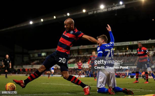 Freddie Sears of Ipswich Town and Alex Baptiste of Queens Park Rangers compete for the ball during the Sky Bet Championship match between Ipswich...