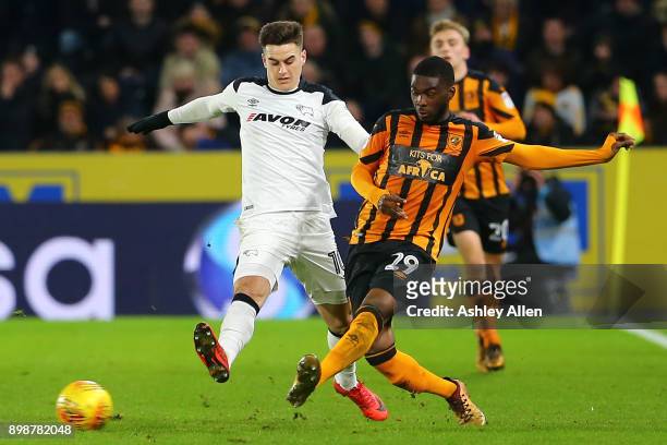 Tom Lawrence of Derby County is challengs Fikayo Tomori of Hull City during the Sky Bet Championship match between Hull City and Derby County at KCOM...