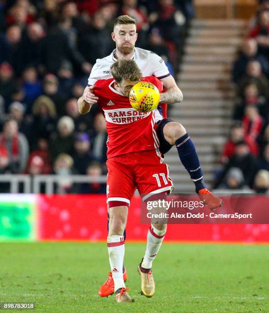 Bolton Wanderers' Mark Beevers battles with Middlesbrough's Patrick Bamford during the Sky Bet Championship match between Middlesbrough and Bolton...