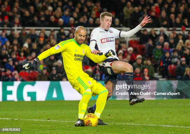 Bolton Wanderers' Josh Vela challenges Middlesbrough's Darren Randolph during the Sky Bet Championship match between Middlesbrough and Bolton...