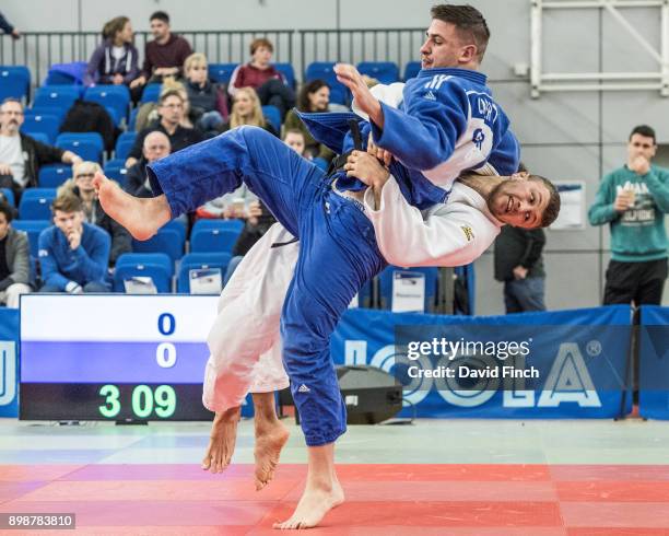 Frazer Chamberlain of Camberley JC throws Cailin Calder of Edinburgh JC without a score eventually losing their first round u90kg contest to Calder...