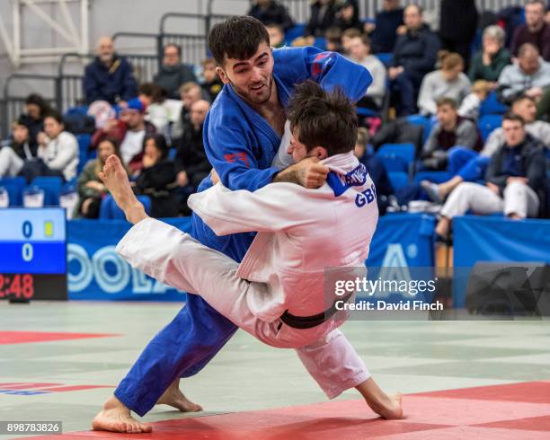 Adam Hoshal of the Budokwai JC throws Matthew Hucker of Midsomer Norton JC for ippon as he advanced to the u81kg bronze medal during the 2017 British...