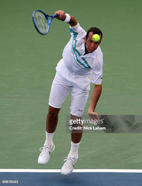Radek Stepanek of the Czech Republic serves against Marat Safin of Russia during day three of the Western & Southern Financial Group Masters on...