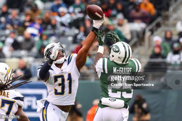 Los Angeles Chargers free safety Adrian Phillips knocks the ball away from New York Jets running back Elijah McGuire during the National Football...