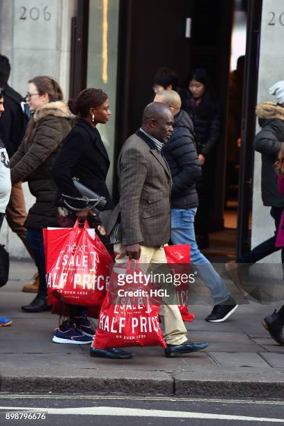Shoppers on Oxford Street hit the Boxing Day Sales on December 26, 2017 in London, England. According to reports, a decrease for in-store shopping is...