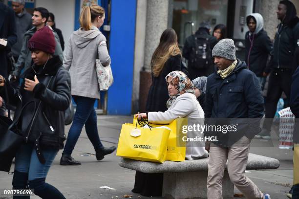 Shoppers on Oxford Street hit the Boxing Day Sales on December 26, 2017 in London, England. According to reports, a decrease for in-store shopping is...