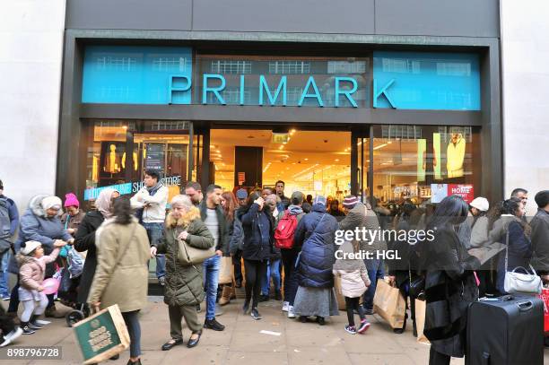 Shoppers on Oxford Street hit the Boxing Day Sales on December 26, 2017 in London, England. According to reports, a decrease for in-store shopping is...