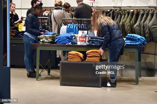 Shoppers on Oxford Street hit the Boxing Day Sales on December 26, 2017 in London, England. According to reports, a decrease for in-store shopping is...