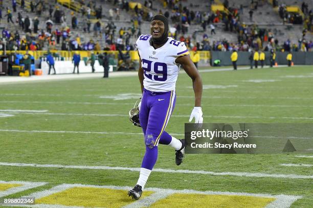 Xavier Rhodes of the Minnesota Vikings leaves the field following a game against the Green Bay Packers at Lambeau Field on December 23, 2017 in Green...