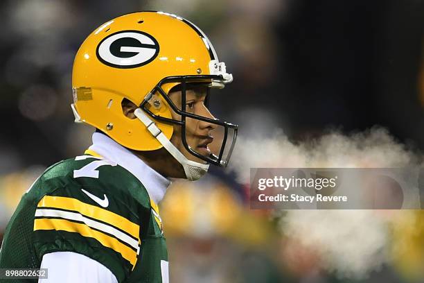 Brett Hundley of the Green Bay Packers walks to the huddle during a game against the Minnesota Vikings at Lambeau Field on December 23, 2017 in Green...