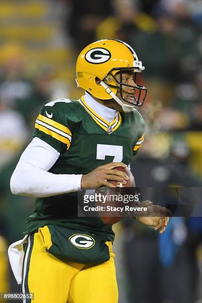 Brett Hundley of the Green Bay Packers drops back to pass during a game against the Minnesota Vikings at Lambeau Field on December 23, 2017 in Green...