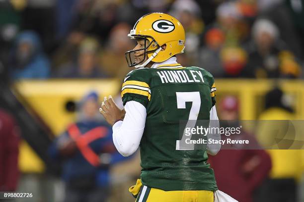 Brett Hundley of the Green Bay Packers drops back to pass during a game against the Minnesota Vikings at Lambeau Field on December 23, 2017 in Green...