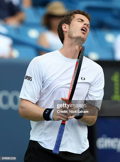 Andy Murray of Great Britain reacts to a missed shot against Nicolas Almagro of Spain during day three of the Western & Southern Financial Group...